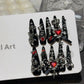 Y2K Menhera Spice Girls Inspired Black & Red Long Tip Handmade Press-On Nails with Cross, Spider, Love, Diamond, and Bow Designs - Cool Dark Nail Art