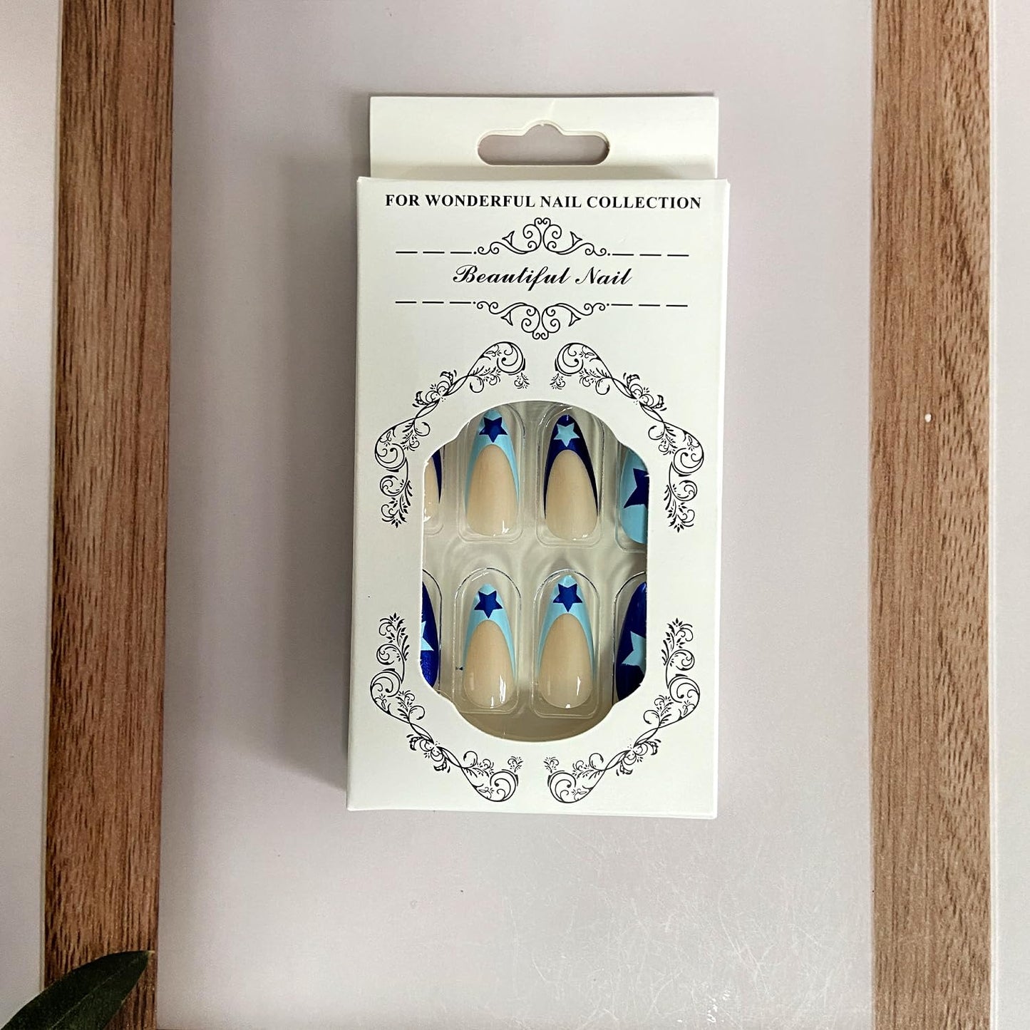 Stunning Blue French Tip Press-On Nails - Medium Almond Shape with Star Designs - 24 Reusable Acrylic Stick-On Nails for Effortless Glam!